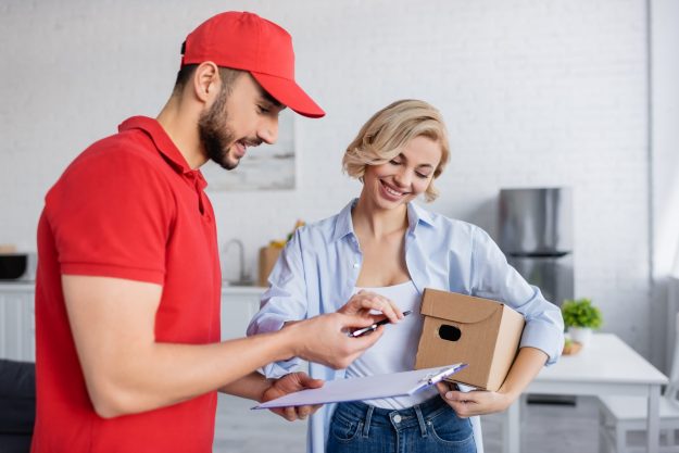 delivery-man-giving-pen