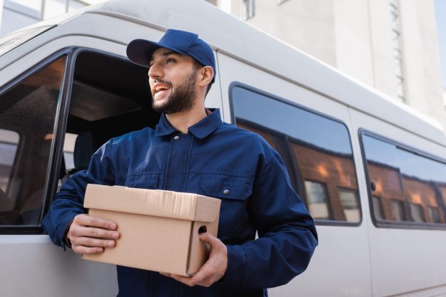 happy-postman-looking-away